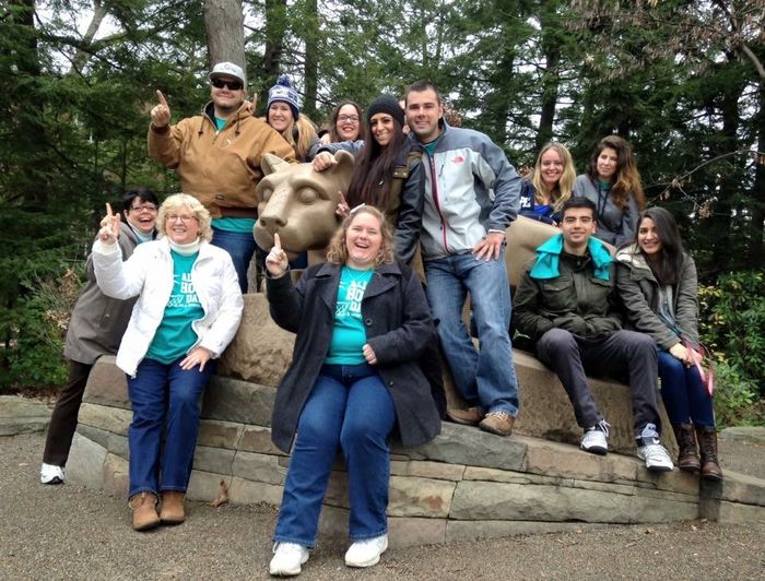 club members at Nittany Lion shrine