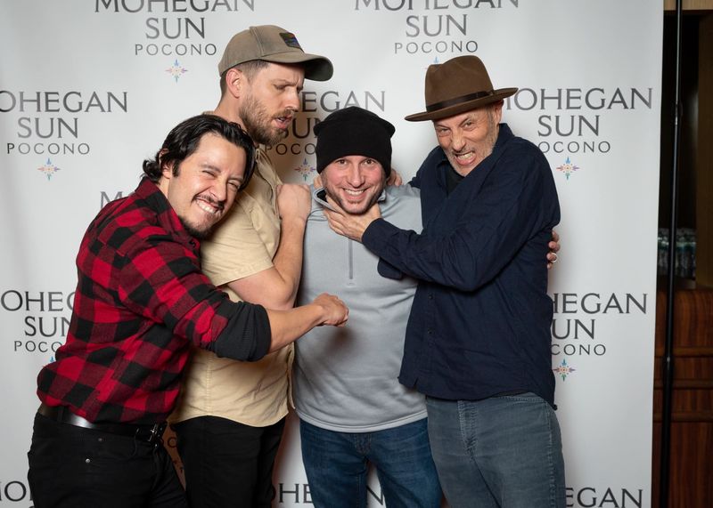 Will Beekman poses for photos with the cast of Napolean Dynamite