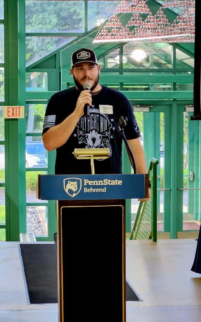 Alumni giving speech