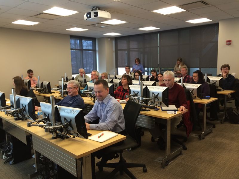 Faculty working in computer lab