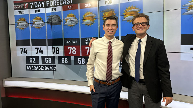 Matt Howard poses with WBRE meterologist Logan Westhrope at the station's weather studio