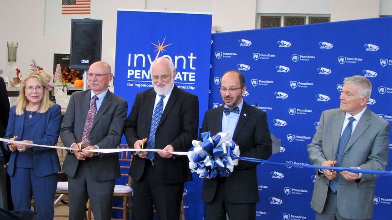 University officials cutting ribbon for Scranton Launchbox